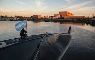 BUENOS AIRES, ARGENTINA - JUNE 02: A crew member of submarine ARA San Juan embarks to set sail after complete the mid-life upgrade reparation at Tandanor shypyard on June 02, 2014 in Buenos Aires, Argentina. (Photo by Ricardo Ceppi/Gettyimages)