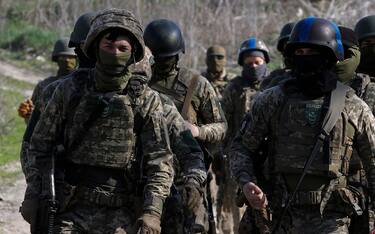 epa11270151 Members of the 'Siberian Battalion' attend their military training on a shooting range near Kyiv, Ukraine, 10 April 2024. The 'Siberian Battalion' military unit was formed as part of the International Legion of the Ukrainian Armed Forces and contains Russian nationals, former military personnel, civil activists and volunteers who choose to fight against Russian troops in Ukraine. Ukraine-aligned Russian fighters from 'Russian Volunteer Corps', 'Siberian Battalion' and 'Freedom of Russia Legion', have been carrying out cross-border raids inside Russiaâ€™s Belgorod and Kursk regions in March 2024.  EPA/SERGEY DOLZHENKO