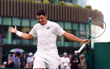Luciano Darderi celebrates winning the fourth set during his match against Jan Choinski (not pictured) on day two of the 2024 Wimbledon Championships at the All England Lawn Tennis and Croquet Club, London. Picture date: Tuesday July 2, 2024.