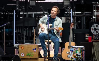 Eddie Vedder performs live on stage supporting The Who during their Moving On tour at Wembley Stadium, London.