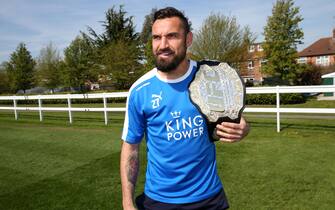 LEICESTER, ENGLAND - MAY 05:  Marcin Wasilewski of Leicester City Pose's With a Special UFC Belt during the Leicester City training session at Belvoir Drive Training Complex on May  5th , 2016 in Leicester, United Kingdom.  (Photo by Plumb Images/Leicester City FC via Getty Images)
