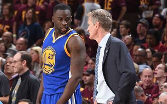 CLEVELAND, OH  - JUNE 10: Draymond Green #23 and Steve Kerr of the Golden State Warriors are seen against the Cleveland Cavaliersduring Game Four of the 2016 NBA Finals at The Quicken Loans Arena on June 10, 2016 in Cleveland, Ohio. NOTE TO USER: User expressly acknowledges and agrees that, by downloading and/or using this Photograph, user is consenting to the terms and conditions of the Getty Images License Agreement. Mandatory Copyright Notice: Copyright 2016 NBAE (Photo by Andrew D. Bernstein/NBAE via Getty Images)