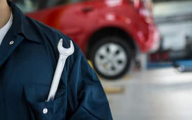 Mechanic with spanner