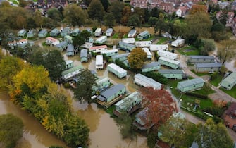 epa10949162 An aerial photograph taken with a drone of a flooded caravan park on the banks of the River Derwent in Stamford Bridge, Britain, 30 October 2023. Severe flood warnings are in place in parts of North Yorkshire following weeks of heavy rain brought by storms Agnes and Babet. The Meteorological Office is forecasting strong winds and heavy rain across southern England as Storm Ciaran is expected to arrive on 01 November.  EPA/ADAM VAUGHAN