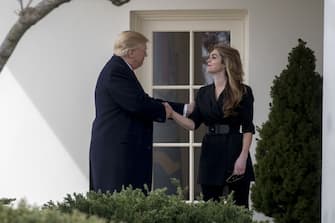 FILE: Bloomberg Best Of U.S. President Donald Trump 2017 - 2020: U.S. President Donald Trump shakes hands with Hope Hicks, outgoing White House communications director, right, outside the Oval Office of the White House in Washington, D.C., U.S., on Thursday, March 29, 2018. Our editors select the best archive images looking back at Trumps 4 year term from 2017 - 2020. Photographer: Andrew Harrer/Bloomberg via Getty Images