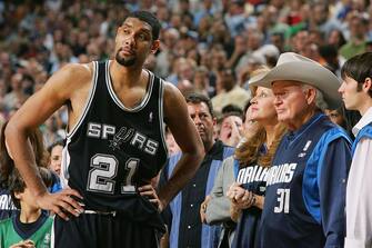 DALLAS, TX - MAY 19:  Tim Duncan #21 of the San Antonio Spurs looks on during the game against the Dallas Mavericks in game six of the Western Conference Semifinals during the 2006 NBA Playoffs at American Airlines Center on May 19, 2006 in Dallas, Texas.  NOTE TO USER: User expressly acknowledges and agrees that, by downloading and/or using this Photograph, user is consenting to the terms and conditions of the Getty Images License Agreement. Mandatory Copyright Notice: Copyright 2006 NBAE  (Photo by Garrett W. Ellwood/NBAE via Getty Images)
