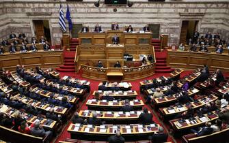 epa10370750 Greek Prime Minister Kyriakos Mitsotakis delivers a speech during a parliament debate prior to a vote on the 2023 state budget, in Athens, Greece, 17 December 2022. The Greek Parliament will vote on the 2023 state budget amidst conditions of great uncertainty globally due to the energy crisis, the inflation and the higher cost of money.  EPA/GEORGE VITSARAS