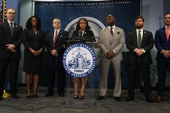 Fulton County District Attorney Fani Willis holds a press conference in the Fulton County Government Center after a grand jury voted to indict former US President Donald Trump and 18 others on August 14, 2023, in Atlanta, Georgia. The Georgia prosecutor who brought sweeping charges against former president Donald Trump and 18 other defendants said Monday, August 14, that she wants to hold their trial "within the next six months."
Fulton County District Attorney Fani Willis said arrest warrants had been issued for Trump and the others charged over their efforts to overturn the 2020 election and they had until August 25 to "voluntarily surrender." (Photo by Christian MONTERROSA / AFP) (Photo by CHRISTIAN MONTERROSA/AFP via Getty Images)