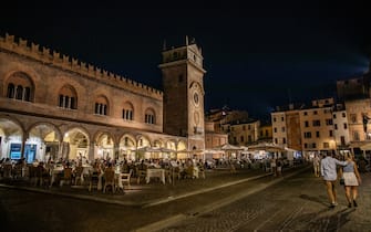 A view of Palazzo della Ragione and Torre dell`Orologio at night, in Mantua, Italy on July 15, 2022.  (Photo by Manuel Romano/NurPhoto via Getty Images)