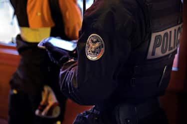 French police officers of the anti-crime squad, Brigade Anti-Criminalite de nuit (BAC N 75) check a suspect during an arrest in a street of Paris on October 16, 2020. (Photo by THOMAS COEX / AFP) (Photo by THOMAS COEX/AFP via Getty Images)