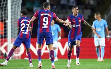 Joao Cancelo of FC Barcelona celebrates with his teammate Robert Lewandowski after scoring goal during the La Liga EA Sports match between FC Barcelona and RC Celta played at Lluis Companys Stadium on September 23, 2023 in Barcelona, Spain. (Photo by Bagu Blanco / pressinphoto / Sipa USA)PHOTO)