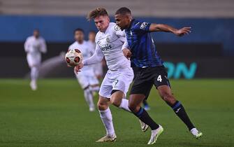 Sporting's Viktor Gyokeres and Atalanta's Isak Malcolm Kwaku Hien during the UEFA Europa League round of 16 second leg soccer match between Atalanta BC and Sporting Clube de Portugal, at Bergamo Stadium in Bergamo, Italy, 14 March 2024.
ANSA/MICHELE MARAVIGLIA