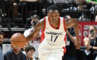 LAS VEGAS, NEVADA - JULY 12: Bub Carrington #17 of the Washington Wizards dribbles the ball up court against the Atlanta Hawks in the first half of a 2024 NBA Summer League game at the Thomas & Mack Center on July 12, 2024 in Las Vegas, Nevada. The Wizards defeated the Hawks 94-88. NOTE TO USER: User expressly acknowledges and agrees that, by downloading and or using this photograph, User is consenting to the terms and conditions of the Getty Images License Agreement. (Photo by Candice Ward/Getty Images)