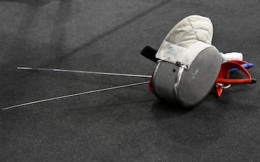 KRAKOW, POLAND - JUNE 27: Fencing mask and saber during a competition at Tauron Arena for the 3rd European Games on June 27, 2023 in Krakow, Poland.
From June 21 to July 2, the 3rd European Games organized by The European Olympic Committees are held in Krakow and nearby cities. The Games are held every 4 years and 50 European national teams take part in it. During the European Games you can watch 29 different sports. (Photo by Klaudia Radecka/NurPhoto via Getty Images)