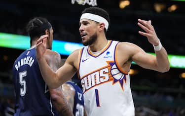 ORLANDO, FLORIDA - JANUARY 28: Devin Booker #1 of the Phoenix Suns reacts after being called for a foul against the Orlando Magic during the third quarter at Kia Center on January 28, 2024 in Orlando, Florida. NOTE TO USER: User expressly acknowledges and agrees that, by downloading and or using this photograph, User is consenting to the terms and conditions of the Getty Images License Agreement. (Photo by Rich Storry/Getty Images)