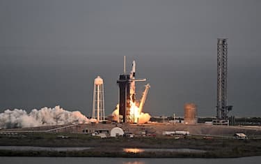 A SpaceX Falcon 9 rocket with its Crew Dragon capsule launches from pad LC-39A during Axiom Mission Three (Ax-3) at the Kennedy Space Center, in Cape Canaveral, Florida, on January 18, 2024. An all-European crew including Turkey's first astronaut are poised to blast off to the International Space Station in a mission with Axiom Space, as countries hungry for a taste of space turn increasingly to the private sector. (Photo by CHANDAN KHANNA / AFP) (Photo by CHANDAN KHANNA/AFP via Getty Images)
