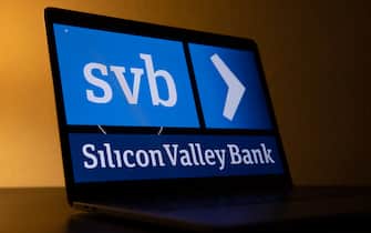 The Silicon Valley Bank logo on a laptop screen arranged in Riga, Latvia, on Friday, March 10, 2023. Panic spread across the startup world as worries about the financial health of Silicon Valley Bank, a major lender to fledgling companies, prompted Peter Thiel’s Founders Fund and other prominent venture capitalists to advise portfolio businesses to withdraw their money, even as the bank’s top executive urged calm. Photographer: Andrey Rudakov/Bloomberg