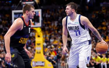 DENVER, COLORADO - NOVEMBER 03:  Nikola Jokic #15 of the Denver Nuggets defends Luka Doncic #77 of the Dallas Mavericks during the fourth quarter during the NBA In-Season Tournament at Ball Arena on November 3, 2023 in Denver, Colorado. NOTE TO USER: User expressly acknowledges and agrees that, by downloading and or using this photograph, User is consenting to the terms and conditions of the Getty Images License Agreement. (Photo by C. Morgan Engel/Getty Images)