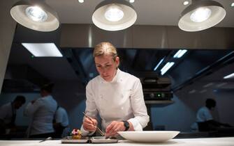 Britain's newest winner of three Michelin stars, Clare Smyth poses for a portrait at her restaurant in west London on May 13, 2021. - During lockdown, British chef Clare Smyth won the ultimate accolade of three Michelin stars for her London restaurant and she is optimistic for the sector despite the current challenges. The 42-year-old from Northern Ireland in January 2021, became the first British woman chef to be awarded three Michelin stars. Only four British chefs have achieved this honour.
 - To go with AFP story by Pauline FROISSART (Photo by JUSTIN TALLIS / AFP) / To go with AFP story by Pauline FROISSART (Photo by JUSTIN TALLIS/AFP via Getty Images)