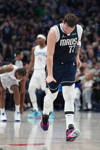 DALLAS, TX - APRIL 26: Luka Doncic #77 of the Dallas Mavericks celebrates during the game against the LA Clippers during Round 1 Game 3 of the 2024 NBA Playoffs on April 26, 2024 at the American Airlines Center in Dallas, Texas. NOTE TO USER: User expressly acknowledges and agrees that, by downloading and or using this photograph, User is consenting to the terms and conditions of the Getty Images License Agreement. Mandatory Copyright Notice: Copyright 2023 NBAE (Photo by Glenn James/NBAE via Getty Images)