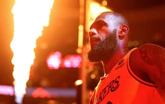 PORTLAND, OREGON - NOVEMBER 17: Flames illuminate LeBron James #23 of the Los Angeles Lakers before the game against the Portland Trail Blazers at Moda Center on November 17, 2023 in Portland, Oregon. NOTE TO USER: User expressly acknowledges and agrees that, by downloading and or using this photograph, User is consenting to the terms and conditions of the Getty Images License Agreement. (Photo by Steph Chambers/Getty Images)