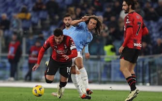 Rome, Italy 01.03.2024: Theo Hernandez of Milan fight for the ball with Matteo Guendouzi of Lazio during Italian Serie A TIM 2023-2024 football match SS LAZIO vs AC MILAN at Olympic Stadium in Rome.