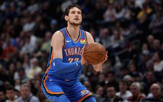 DENVER, COLORADO - DECEMBER 14: Mike Muscala #33 of the Oklahoma City Thunder puts up a shot against the Denver Nuggets in the second quarter at Pepsi Center on December 14, 2019 in Denver, Colorado. NOTE TO USER: User expressly acknowledges and agrees that, by downloading and or using this photograph, User is consenting to the terms and conditions of the Getty Images License Agreement. (Photo by Matthew Stockman/Getty Images)