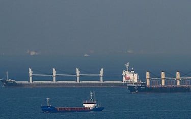 TOPSHOT - Cargo ship Rubymar (R), carrying Ukrainian grain, and cargo ship Stella GS (L) originating from Ukraine, sail at the entrance of Bosphorus, in the Black Sea off the coast off Kumkoy, north of Istanbul, on November 2, 2022. - President Recep Tayyip Erdogan said the traffic of vessels carrying Ukrainian grain and other agricultural products resumed on November 2, 2022, after a telephone call between the Turkish and Russian defence ministers. Russian Defence Minister Sergei Shoigu called Turkish counterpart Hulusi Akar to inform that "the grain shipments will continue from 12.00 today as planned before," Erdogan said in parliament. (Photo by Ozan KOSE / AFP) (Photo by OZAN KOSE/AFP via Getty Images)