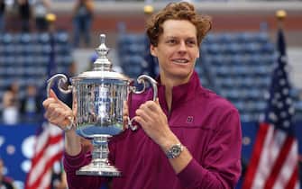 NEW YORK, NEW YORK - SEPTEMBER 08:  Jannik Sinner of Italy celebrates with the winners trophy after defeating Taylor Fritz of the United States to win the Men's Singles Final on Day Fourteen of the 2024 US Open at USTA Billie Jean King National Tennis Center on September 08, 2024 in the Flushing neighborhood of the Queens borough of New York City. (Photo by Sarah Stier/Getty Images)