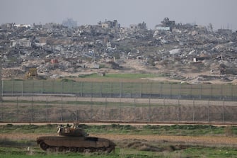 epa11085192 An Israeli tank is on a position near the Israeli border with the Gaza Strip, in southern Israel, 17 January 2024. More than 24,400 Palestinians and at least 1,300 Israelis have been killed, according to the Palestinian Health Ministry and the Israel Defense Forces (IDF), since Hamas militants launched an attack against Israel from the Gaza Strip on 07 October, and the Israeli operations in Gaza and the West Bank which followed it.  EPA/ABIR SULTAN