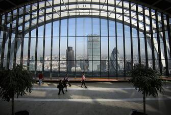 LONDON, ENGLAND - MARCH 12:  Visitors to the Sky Garden at 20 Fenchurch Street enjoy the view on March 12, 2015 in London, England. Number 20 Fenchurch Street is London's newest skyscraper, known locally as The Walkie Talkie. The Sky Garden sits at the top of the 160 metre, 500 million GBP building and is now open to the public. (Photo by Peter Macdiarmid/Getty Images)