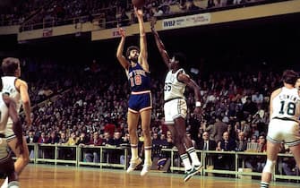 BOSTON - 1974:  Phil Jackson #19 of the New York Knicks shoots over Paul Silas #35 of the Boston Celtics during a game played in 1974 at the Boston Garden in Boston, Massachusetts. NOTE TO USER: User expressly acknowledges and agrees that, by downloading and or using this photograph, User is consenting to the terms and conditions of the Getty Images License Agreement. Mandatory Copyright Notice: Copyright 1974 NBAE (Photo by Dick Raphael/NBAE via Getty Images)