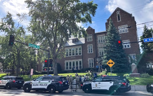 Police and first responders work at the scene of a shooting near Annunciation Church and Catholic School in Minneapolis, Minneosta, on August 27, 2025. US police responded Wednesday morning to a shooting at a Catholic school in Minneapolis, with officials saying that the shooter had been "contained." Local media, citing police sources, reported that the shooter was dead. (Photo by Tom BAKER / AFP)
