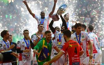 18 May 2019, Berlin: Volleyball, Men: Champions League, Zenit Kazan - Cucine Lube Civitanova, knockout round, final. The players of Civitanova cheer after the 3:1 victory with the trophy. Photo: Soeren Stache/dpa (Photo by Soeren Stache/picture alliance via Getty Images)