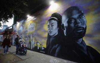 LOS ANGELES, CALIFORNIA - FEBRUARY 14: A mural depicting deceased NBA star Kobe Bryant and his daughter Gianna, painted by @hijackart, is displayed along a sidewalk on February 14, 2020 in Los Angeles, California. Numerous murals depicting Bryant and Gianna have been created around greater Los Angeles following their tragic deaths in a helicopter crash which left a total of nine dead. A public memorial service honoring Bryant will be held February 24 at the Staples Center in Los Angeles, where Bryant played most of his career with the Los Angeles Lakers.  (Photo by Mario Tama/Getty Images)
