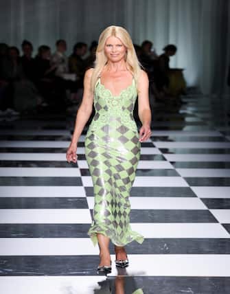 MILAN, ITALY - SEPTEMBER 22: Claudia Schiffer walks the runway at the Versace fashion show during the Milan Fashion Week Womenswear Spring/Summer 2024 on September 22, 2023 in Milan, Italy. (Photo by Victor Boyko/Getty Images)