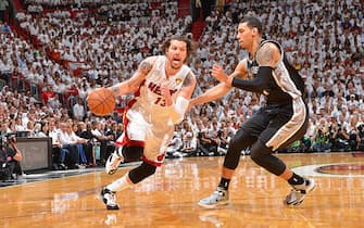 MIAMI, FL - JUNE 18: Mike Miller #13 of the Miami Heat drives against Danny Green #4 of the San Antonio Spurs during Game Six of the 2013 NBA Finals on June 18, 2013 at American Airlines Arena in Miami, Florida. NOTE TO USER: User expressly acknowledges and agrees that, by downloading and or using this photograph, User is consenting to the terms and conditions of the Getty Images License Agreement. Mandatory Copyright Notice: Copyright 2013 NBAE (Photo by Jesse D. Garrabrant/NBAE via Getty Images)