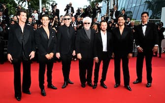 Spanish film director Pedro Almodovar (C) arrives with (from L) Spanish actor Manu Rios, Spanish actor Jason Fernandez, US actor Ethan Hawke, Belgian-Italian producer and creative director of Yves Saint Laurent Anthony Vaccarello, Portuguese actor Jose Condessa and actor George Steane for the screening of the film "Extrana Forma de Vida" (Strange Way of Life) during the 76th edition of the Cannes Film Festival in Cannes, southern France, on May 17, 2023. (Photo by Patricia DE MELO MOREIRA / AFP) (Photo by PATRICIA DE MELO MOREIRA/AFP via Getty Images)