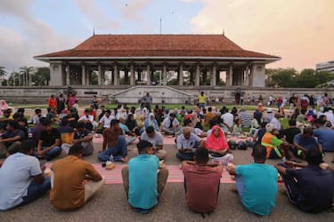 epa11264510 Sri Lankan Muslims gather to eat Iftar, the meal traditionally taken after sunset prayers to break the Ramadan daily fast, at Independence Square in Colombo, Sri Lanka, 07 April 2024. The Muslims' holy month of Ramadan is the ninth month in the Islamic calendar and it is believed that the revelation of the first verse in the Koran was during its last 10 nights. It is celebrated yearly by praying during the night time and abstaining from eating, drinking, and sexual acts during the period between sunrise and sunset. It is also a time for socializing, mainly in the evening after breaking the fast and a shift of all activities to late in the day in most countries.  EPA/CHAMILA KARUNARATHNE