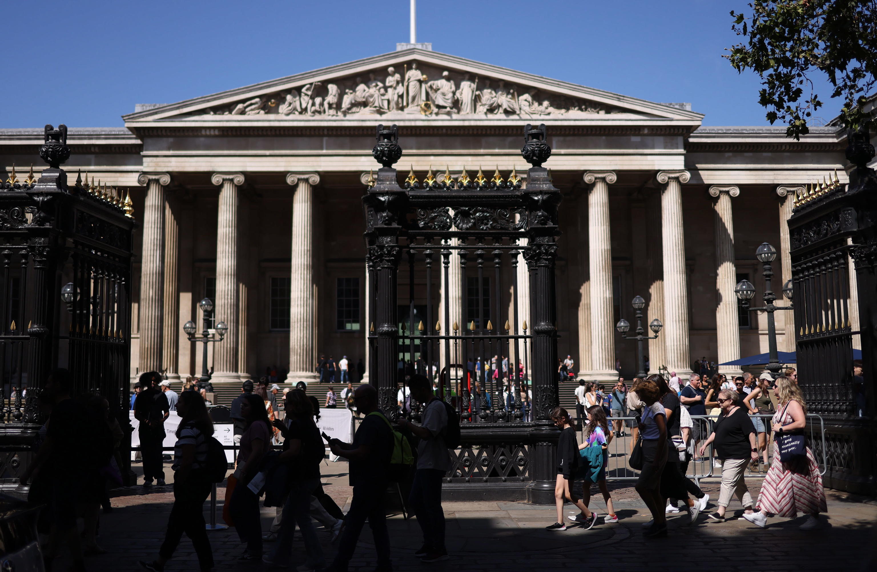 epa10815581 People pass the British Museum in London, Britain, 23 August 2023. The British Museum dismissed a member of staff and the Metropolitan Police are investigating after artefacts which were reported 'missing, stolen or damaged' over a 'significant' period of time. Art dealer Ittai Gradel alleges that in February 2021 he had notified the British Museum to be aware of potentially stolen items from the collection but was reportedly told "all objects were accounted for".  EPA/NEIL HALL