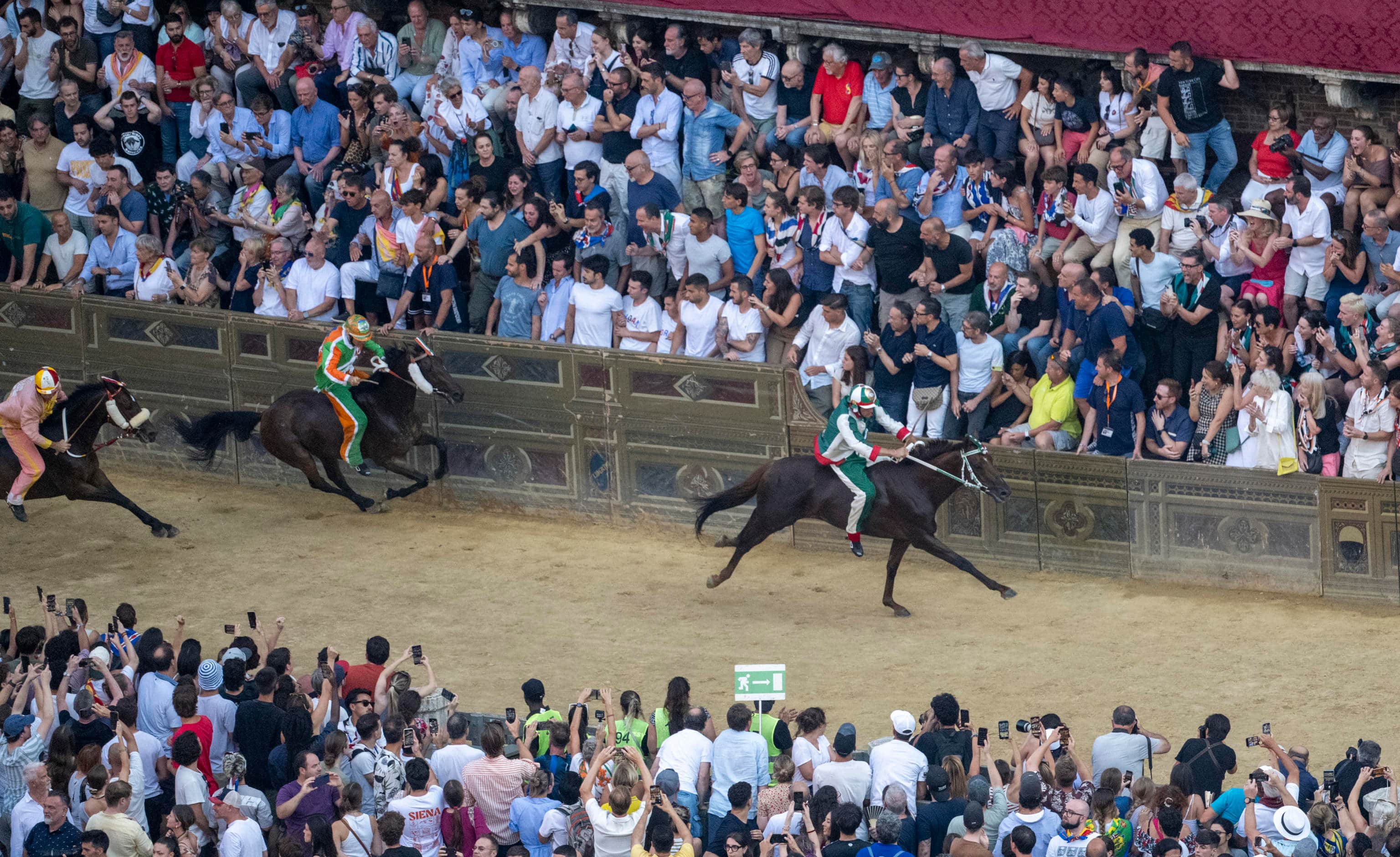 Jockey Giovanni Atzeni , also known as Tittia , on horse Diodoro  in action before winning the historical horse race 'Palio di Siena' on Piazza del Campo in Siena, Italy, 03 July 2024.  The traditional horse races between 17 Siena city districts called takes place on 02 July as the 'Palio di Provenzano' on the holiday of the Madonna of Provenzano and on 16 August 2025 as the 'Palio dell'Assunta' on the holiday of the Virgin Mary. 
ANSA/CLAUDIO GIOVANNINI
