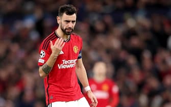 epa11025451 Bruno Fernandes of Manchester United gestures during the UEFA Champions League group match between Manchester United and FC Bayern Munich, in Manchester, Britain, 12 December 2023.  EPA/ADAM VAUGHAN