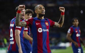 epa11283017 FC Barcelona's Raphinha celebrates after scoring the 1-0 goal during the UEFA Champions League quarter finals second leg soccer match between FC Barcelona and Paris Saint-Germain, in Barcelona, Spain, 16 April 2024.  EPA/Alberto Estevez