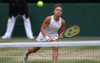 epa11475774 Jasmine Paolini of Italy in action during her Women's Singles final match against Barbora Krejcikova of the Czech Republic at the Wimbledon Championships in London, Britain, 13 July 2024.  EPA/NEIL HALL  EDITORIAL USE ONLY