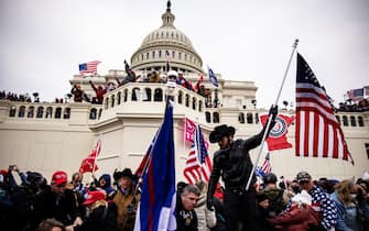 WASHINGTON, DC - JANUARY 06: Pro-Trump supporters storm the US Capitol following a rally with President Donald Trump on January 6, 2021 in Washington, DC. Trump supporters gathered in the nation's capital today to protest the ratification of President-elect Joe Biden's Electoral College victory over President Trump in the 2020 election. (Photo by Samuel Corum/Getty Images)