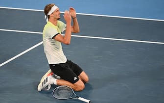 Germany's Alexander Zverev celebrates winning the Tokyo 2020 Olympic men's singles tennis final match against Russia's Karen Khachanov at the Ariake Tennis Park in Tokyo on August 1, 2021. (Photo by Vincenzo PINTO / AFP) (Photo by VINCENZO PINTO/AFP via Getty Images)