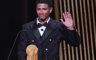 Real Madrid's English midfielder Jude Bellingham gestures on stage as he recieves with the Kopa Trophy for best under-21 player during the 2023 Ballon d'Or France Football award ceremony at the Theatre du Chatelet in Paris on October 30, 2023. (Photo by FRANCK FIFE / AFP) (Photo by FRANCK FIFE/AFP via Getty Images)