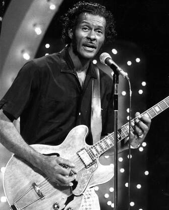 Photo of Chuck Berry on the television program The Midnight Special (Nov 1973). RETRO photographs of rock legends Elvis Presley and Chuck Berry have emerged on the anniversary of the first celebrities being inducted into the legendary Rock ‘n’ Roll Hall of Fame. Vintage photos show the classic Jailhouse Rock singer Elvis Presley performing live at the Mississippi-Alabama Fairgrounds in 1956 and another picture of him posing next to then-President of America, Richard Nixon, in the Oval Office of the White House. Another picture shows Elvis being sworn into the US Army as part of his induction in Arkansas, 1958. Further images depict the charisma of Chuck Berry strumming on his guitar during the Midnight Special TV programme in 1973 and a publicity picture for Brunswick Records of Buddy Holly in 1957. Other pictures show Buddy Holly with his famous thick-rimmed black glasses posing with Waylon Jennings in a photobooth in New York, 1959. Associate curator of the museum, Meredith Rutledge-Borger started working there from 1999 as a visitor representative. Public domain / mediadrumworld.com