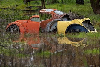 PORTERVILLE, CA - MARCH 10: Flood waters surround a car in a field on March 10, 2023 near Porterville, California. Another in a series of atmospheric river storms from the Pacific Ocean has brought a warm rain to the region, which is falling on top of, and melting, large areas of snow in the Sierra Nevada Mountains, increasing the risk of floods at lower elevations. This years destructive and deadly storms have produced heavy rains and a near-record snowpack in the Sierras, which provides water for millions of Californians. As a result of one of Californias wettest winters on record, most of the state has gotten relief from years of drought. (Photo by David McNew/Getty Images)