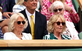 LONDON, ENGLAND - JULY 12: Camilla, Queen Consort (L) looks on with guest, Annabel Elliot in the Royal Box during the Women's Singles Quarter Final match between Ons Jabeur of Tunisia and Elena Rybakina of Kazakhstan during day ten of The Championships Wimbledon 2023 at All England Lawn Tennis and Croquet Club on July 12, 2023 in London, England. (Photo by Patrick Smith/Getty Images)